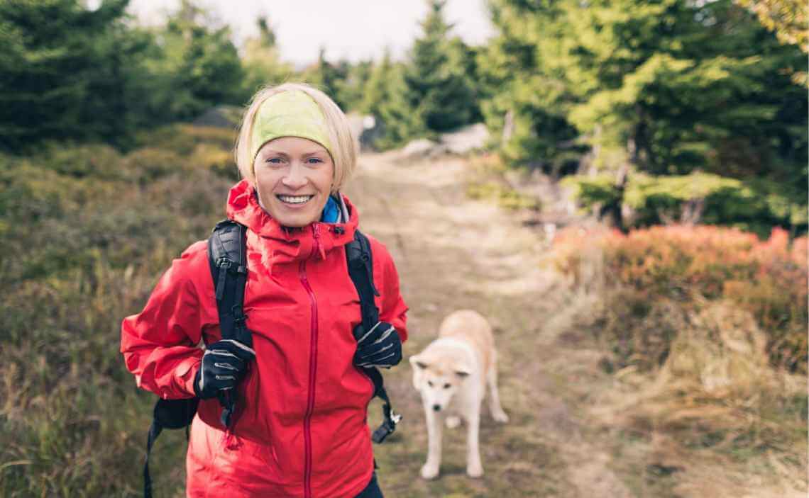 extra blog image woman backpacking with dog winter camping
