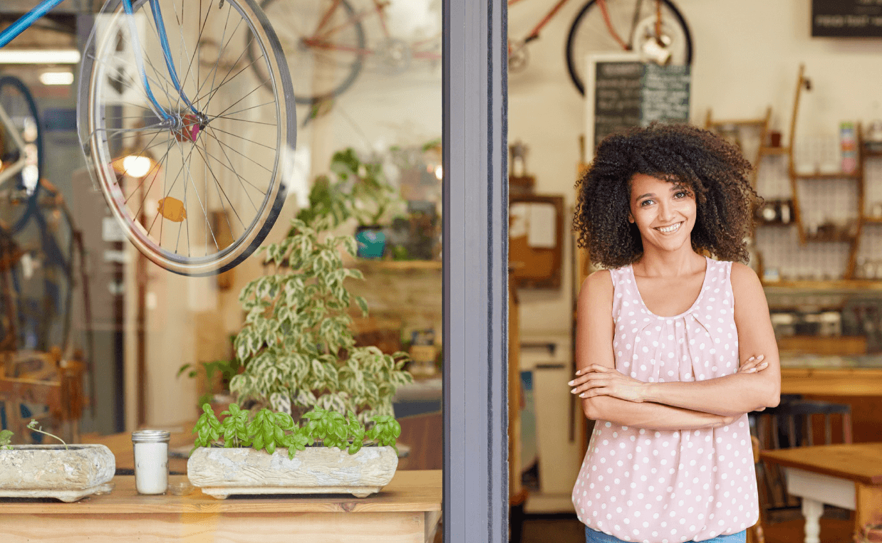 small business owner in front of bicycle shop