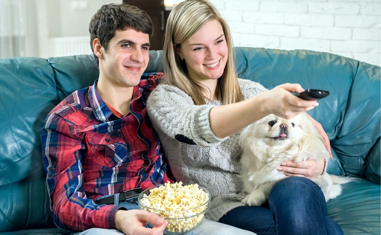 DOG MOVIES couple with popcorn