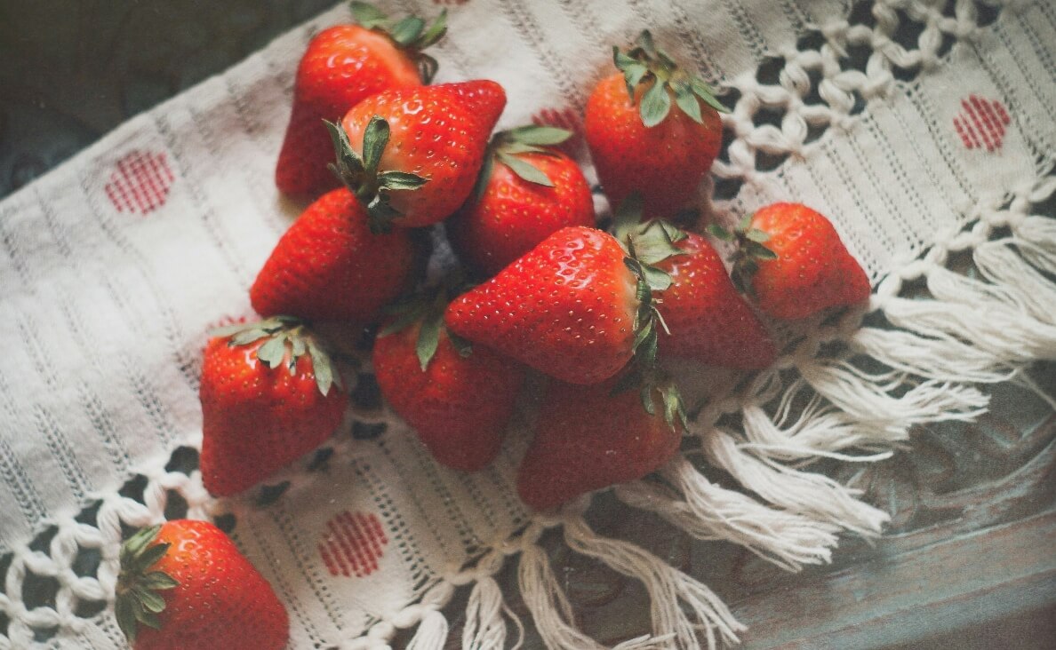 STRAWBERRIES ON A TABLE RUNNER